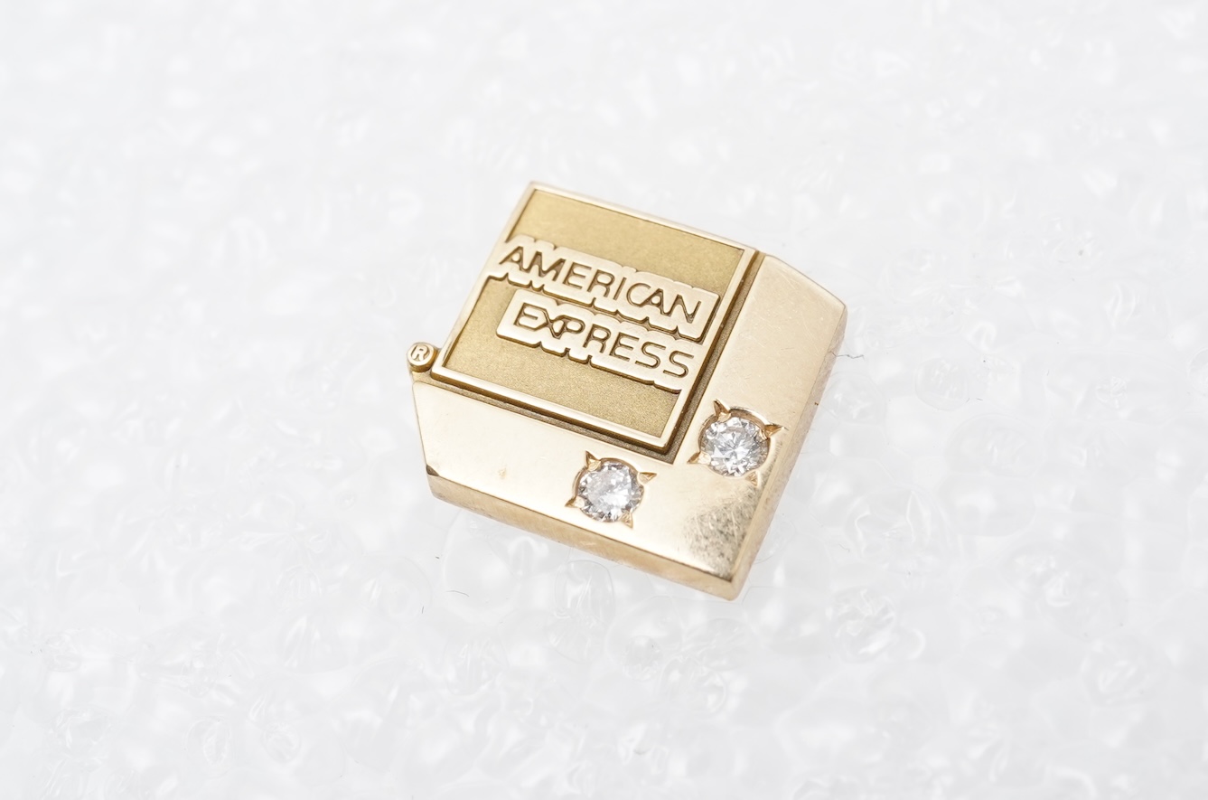 A gold and diamond novelty pin
